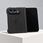 Louis Vuitton Relief Monogram iPhone Duo Case in Black — studio view