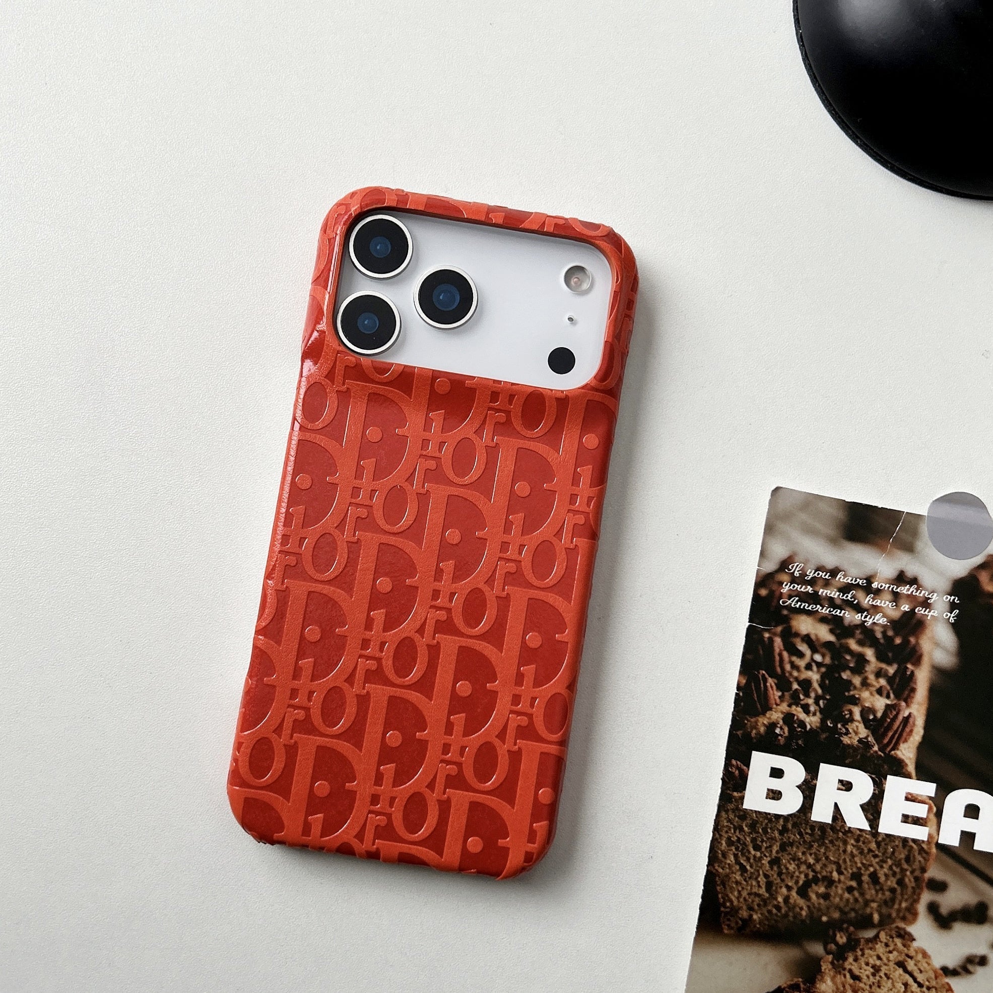 Dior iPhone 17 Pro Max leather case in orange