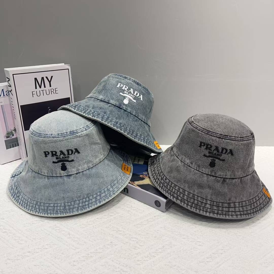 Prada denim bucket hats in multiple colors