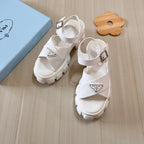 Prada Triangle Logo Thick Sole Cross Sandals – sandals product image 6