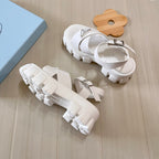 Prada Triangle Logo Thick Sole Cross Sandals – sandals product image 7