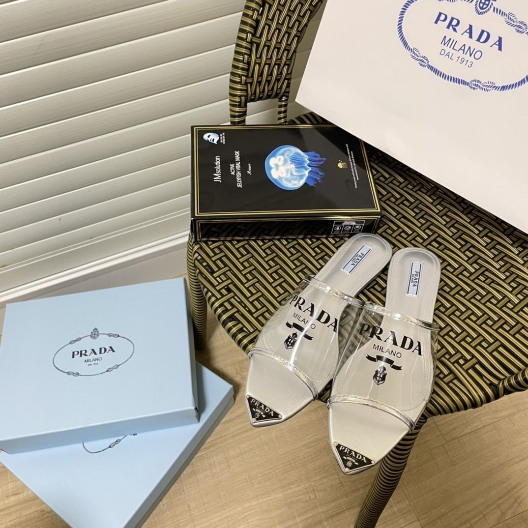 Prada Triangle Logo Transparent Flat Slippers – slippers product image 1