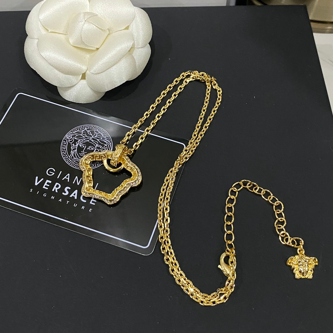 Versace Vintage Cutout Medusa Necklace – Luxury Designer Jewelry – product image 1